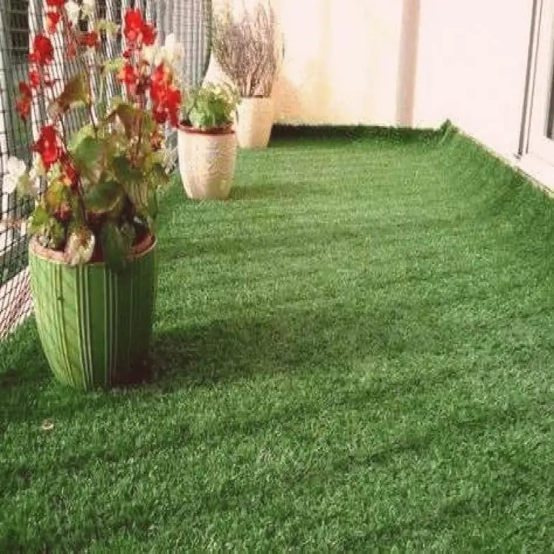 Green synthetic grass flooring for stylish outdoor areas