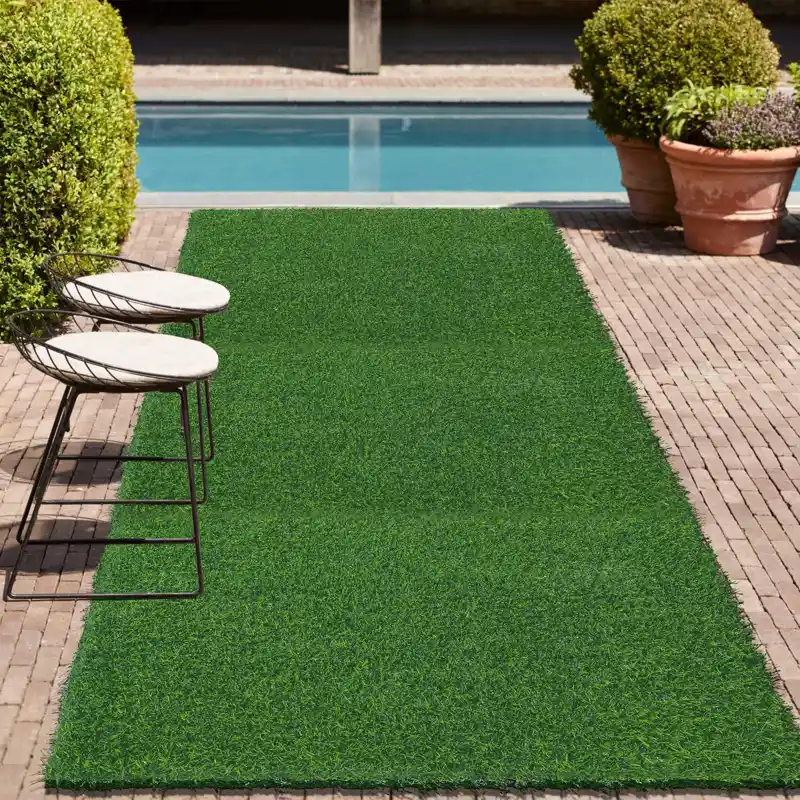 Range of soft artificial grass carpets with realistic green texture