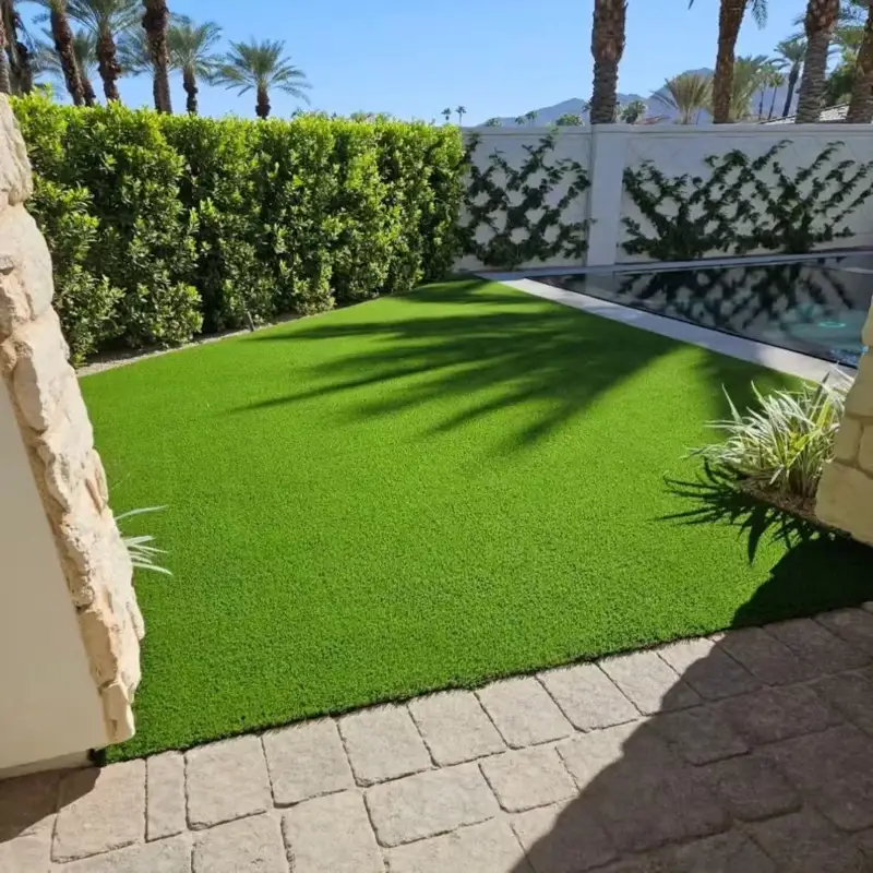 Soft artificial grass carpet used for outdoor landscaping